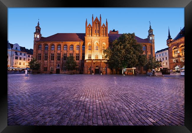 Town Hall in Torun at Dusk Framed Print by Artur Bogacki