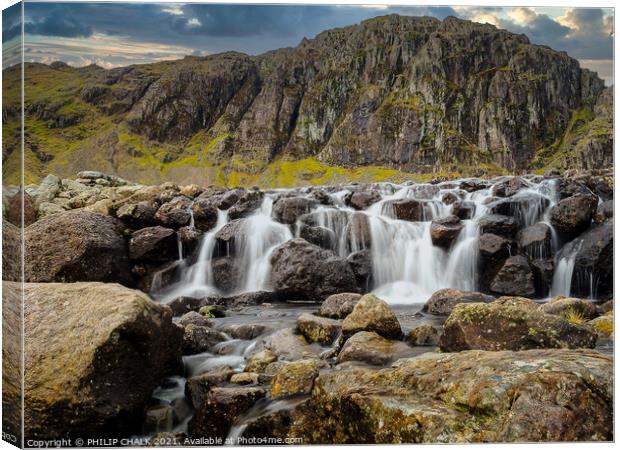 Stickle tarn waterfall  situated in the Langdale area of Cumbria  Canvas Print by PHILIP CHALK