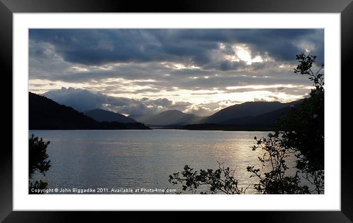 Loch Leven at dusk. Framed Mounted Print by John Biggadike