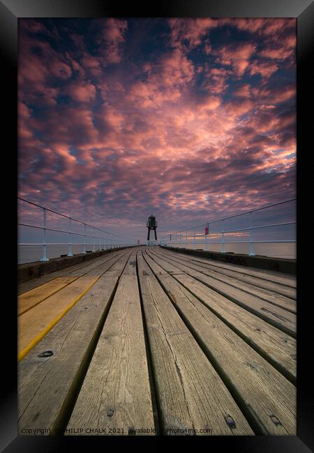 Whitby pier sunrise on the Yorkshire east coast Framed Print by PHILIP CHALK
