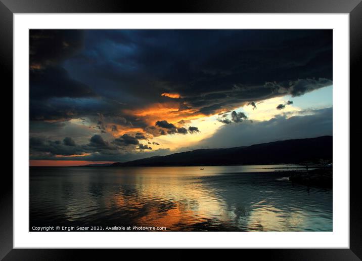 A colorful idyllic sunset after rain Framed Mounted Print by Engin Sezer