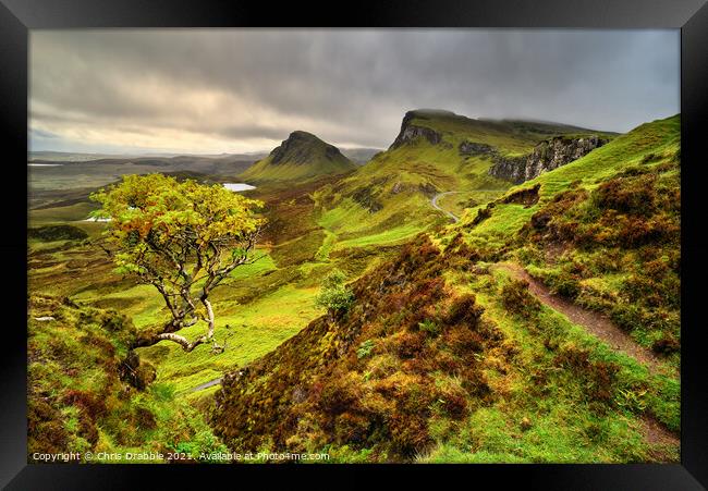Rain clouds over the Quiraing Framed Print by Chris Drabble