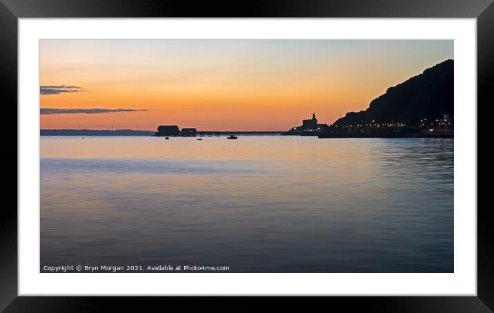 Mumbles lighthouse and pier at sunrise Framed Mounted Print by Bryn Morgan