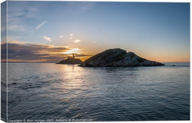 Mumbles lighthouse at sunrise Canvas Print by Bryn Morgan