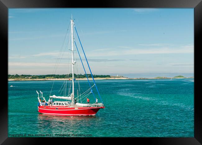 Red Yacht coming into St Marys Isles of Scilly Framed Print by Nick Jenkins