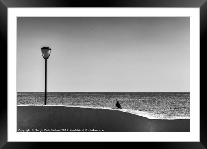 In front of the sea Framed Mounted Print by Sergio Delle Vedove