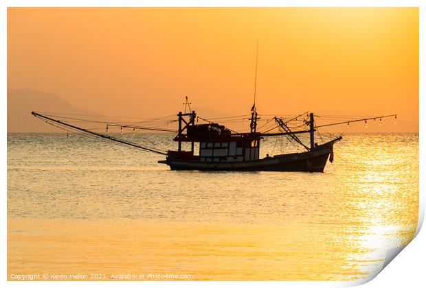 Fishing boat at sunset Print by Kevin Hellon