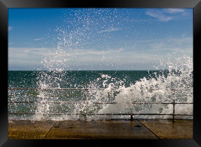Waves braking over the seawall at The Garrison, Shoeburyness, Essex, UK. Framed Print by Peter Bolton