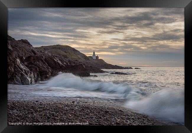 Mumbles lighthouse viewed from Bracelet bay Framed Print by Bryn Morgan