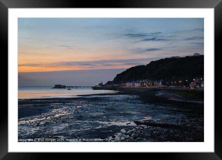 Mumbles pier and lighthouse at sunrise Framed Mounted Print by Bryn Morgan