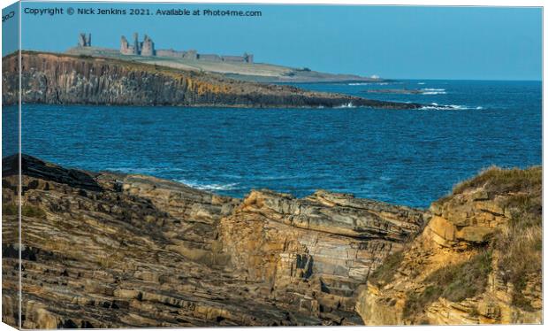 Dunstanburgh Castle seen from Howick Northumberlan Canvas Print by Nick Jenkins