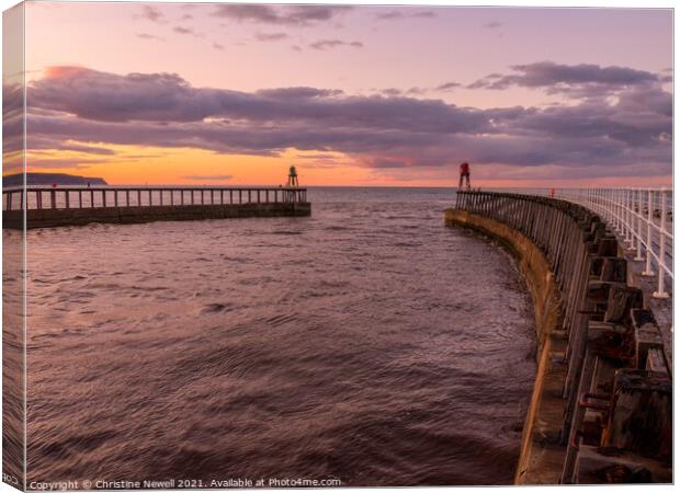 Whitby Harbour as the Sun Sets Canvas Print by Christine Newell