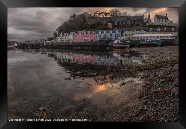 Portree pier in the afternoon reflected in Loch Portree Framed Print by Richard Smith