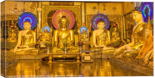 A room of golden Buddhas at the Shwedagon Pagoda, Yangon, Myanmar Canvas Print by SnapT Photography