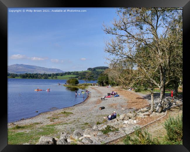 Bala lake Gravely Beach in Wales Framed Print by Philip Brown