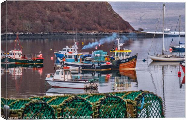 Fishermen at work in Portree harbour photographed from behind a stack of creels. Canvas Print by Richard Smith