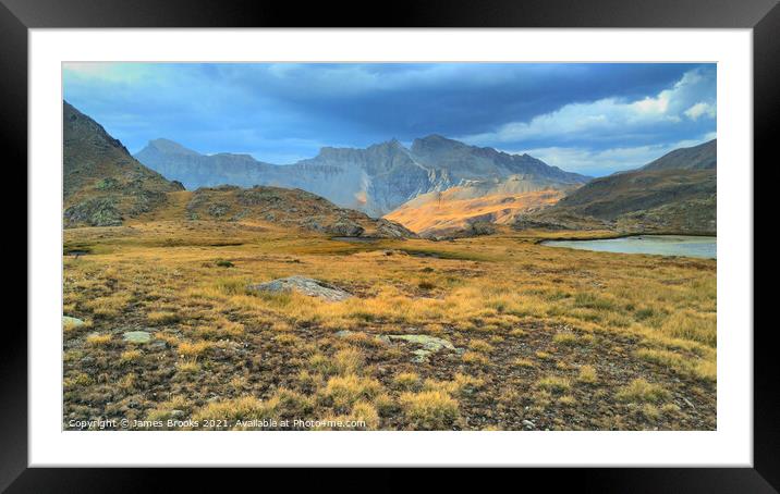 A dry lake in Mercantour national park, France Framed Mounted Print by James Brooks