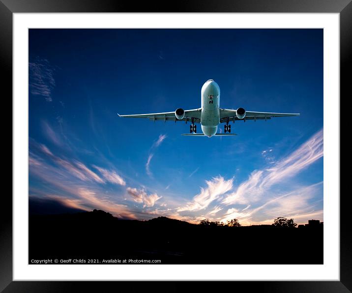 Jet Airliner Flying in a sunset sky. Framed Mounted Print by Geoff Childs