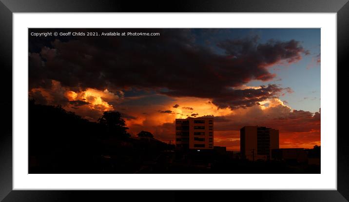 Dramatic red stormy sunset clouds.  Framed Mounted Print by Geoff Childs