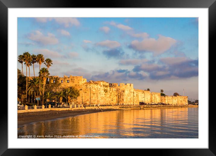Early morning sunlight bathes the castle of Kos Framed Mounted Print by Kevin Hellon