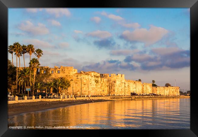 Early morning sunlight bathes the castle of Kos Framed Print by Kevin Hellon