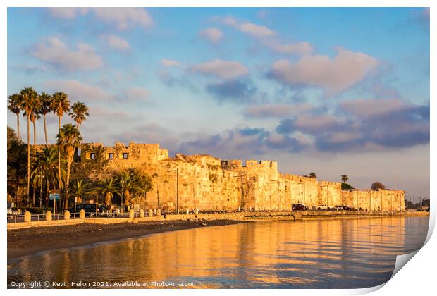 Early morning sunlight bathes the castle of Kos Print by Kevin Hellon