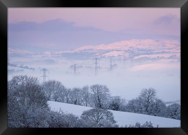 Pylons in the Mist Framed Print by Clive Ashton