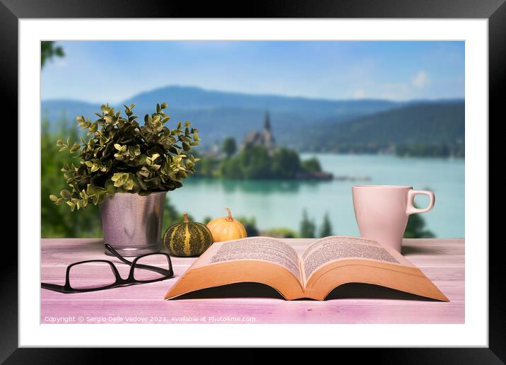A book opened on the table Framed Mounted Print by Sergio Delle Vedove
