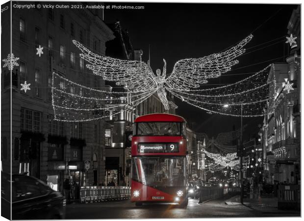 Red bus at Regent Street St James at Christmas, Lo Canvas Print by Vicky Outen