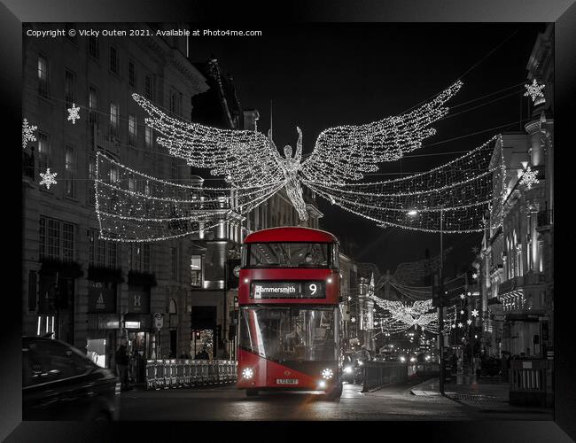 Red bus at Regent Street St James at Christmas, Lo Framed Print by Vicky Outen