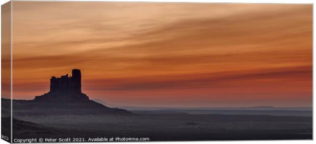 Post sunrise at Monument Valley Canvas Print by Peter Scott
