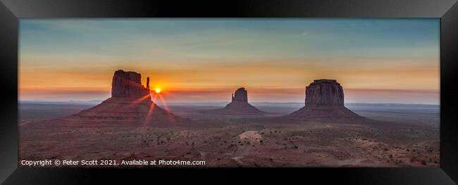 A sunrise at Monument Valley. Framed Print by Peter Scott