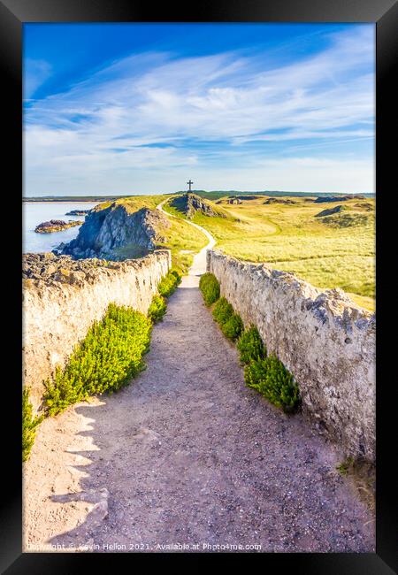 Pathway leading to a cross on Llanddwyn Island, An Framed Print by Kevin Hellon