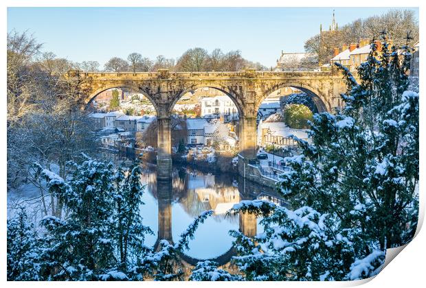 Winter snow sunrise over the railway viaduct and river Nidd in Knaresborough, North Yorkshire.  Print by mike morley