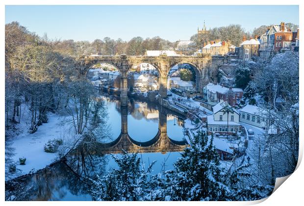 Winter snow sunrise over the railway viaduct and river Nidd in Knaresborough, North Yorkshire.  Print by mike morley