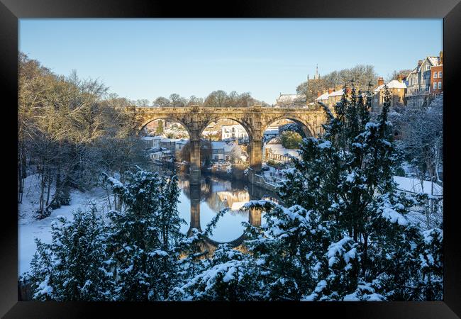 Winter snow sunrise over the railway viaduct and river Nidd in Knaresborough, North Yorkshire.  Framed Print by mike morley