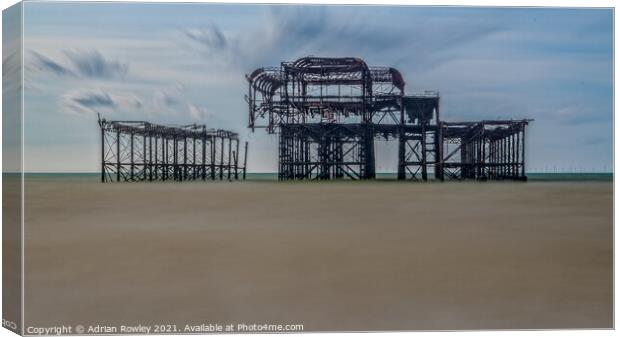 Brighton and The West Pier Canvas Print by Adrian Rowley