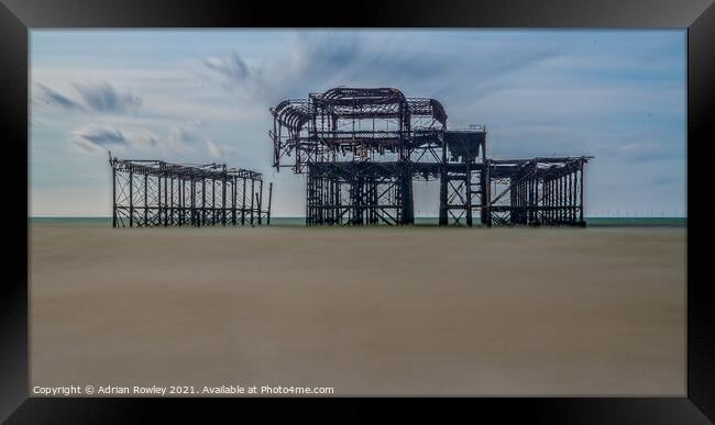 Brighton and The West Pier Framed Print by Adrian Rowley