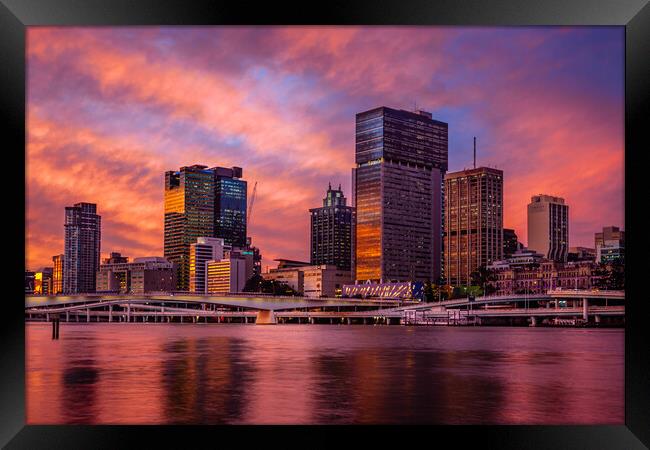 Brisbane City Skyline at Sunset Framed Print by John Frid
