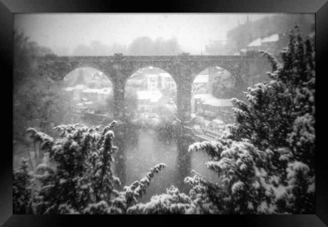 Winter snow storm over the railway viaduct at Knaresborough, North Yorkshire, UK Framed Print by mike morley