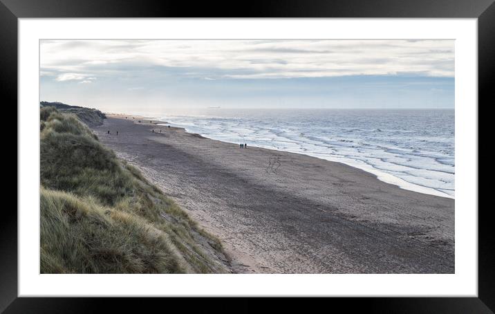 Foot prints dotted over the beach at Formby Framed Mounted Print by Jason Wells