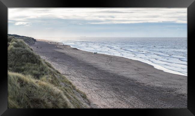 Foot prints dotted over the beach at Formby Framed Print by Jason Wells