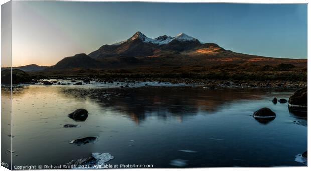 First winter sunlight upon the Black Cuillin mountains of Skye. Canvas Print by Richard Smith