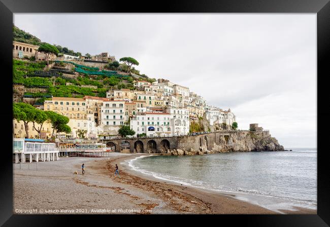 Amalfi Beach on an overcast day Framed Print by Laszlo Konya