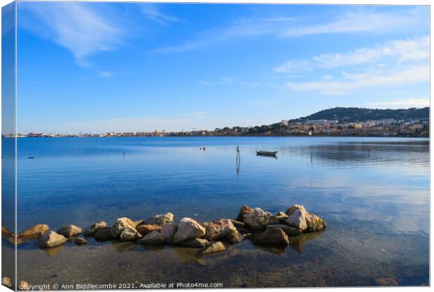 Sete from the  Lagoon Canvas Print by Ann Biddlecombe
