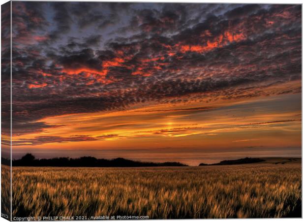 Fire in the sky on the south wales coast near Trefin 73 Haverfordwest area. Canvas Print by PHILIP CHALK