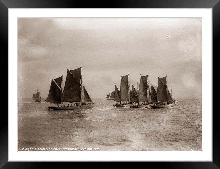 Early 1900's sailing fishing Smacks  off East Angl Framed Mounted Print by Kevin Allen