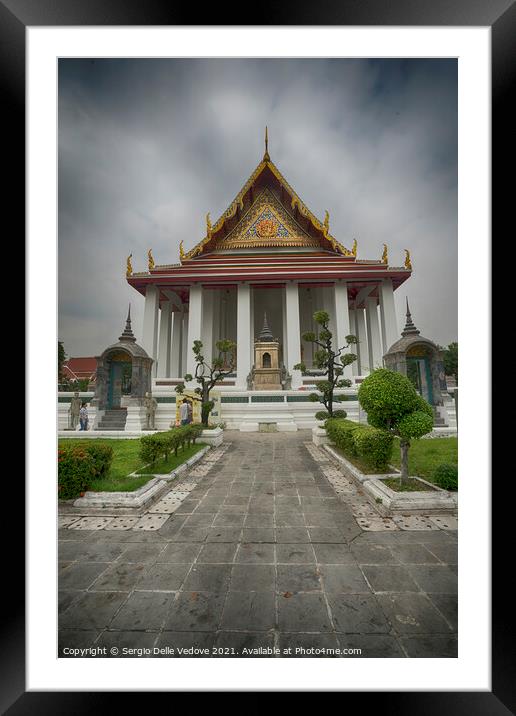 Wat Suthat temple in Bangkok Framed Mounted Print by Sergio Delle Vedove
