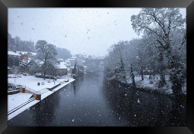 Winter snow over the river Nidd and famous landmark railway viaduct in Knaresborough, North Yorkshire Framed Print by mike morley