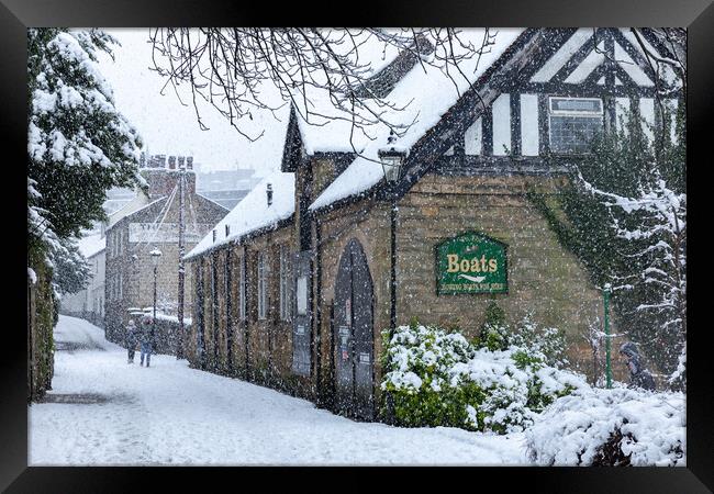 Winter snow in the town of Knaresborough, North Yorkshire Framed Print by mike morley